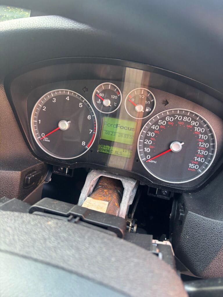 a close up of a ford clocks